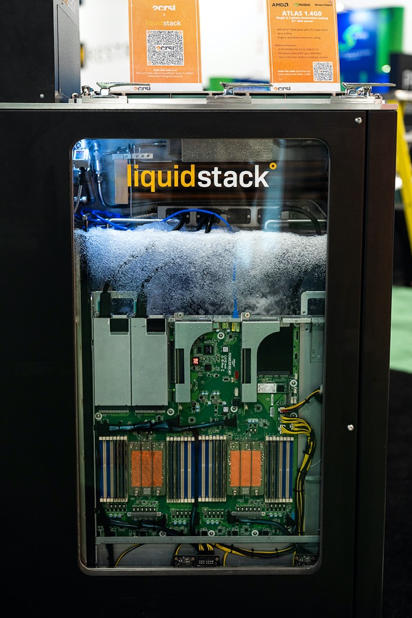 A supercompute node in a liquid immersion cooling system.