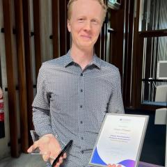 RCC's Owen Powell with his DVCRI Individual Excellence Award and trophy. (Photo: Jake Carroll, RCC.)