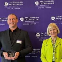 RCC's Dr Edan Scriven accepted the UQ Research Culture Award from UQ Vice-Chancellor Professor Deborah Terry.