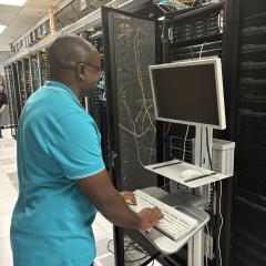 UQ's Dr Paul Visendi Muhindira using the San Diego Supercomputer Center's Expanse HPC. 
