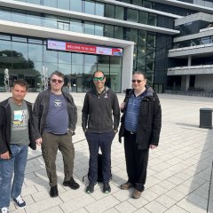 RCC's Jake Carroll (second from right) and Ashley Wright (far right) outside the ISC 2023 conference venue in Hamburg. With Jake and Ashley are David Cole (far left) from OneTeamIT and Andrew Beattie from IBM. Both David and Andrew are involved with UQ's research data storage infrastructure and the ARDC Nectar Research Cloud used by UQ researchers.