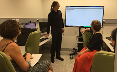 RCC’s Edan Scriven (standing) ran an ImageTrove software tutorial at UQ’s Centre for Microscopy and Microanalysis for its Instrument Operators on Tuesday, 23 February.