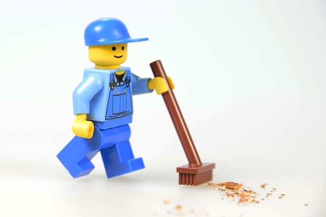 LEGO man cleaning up