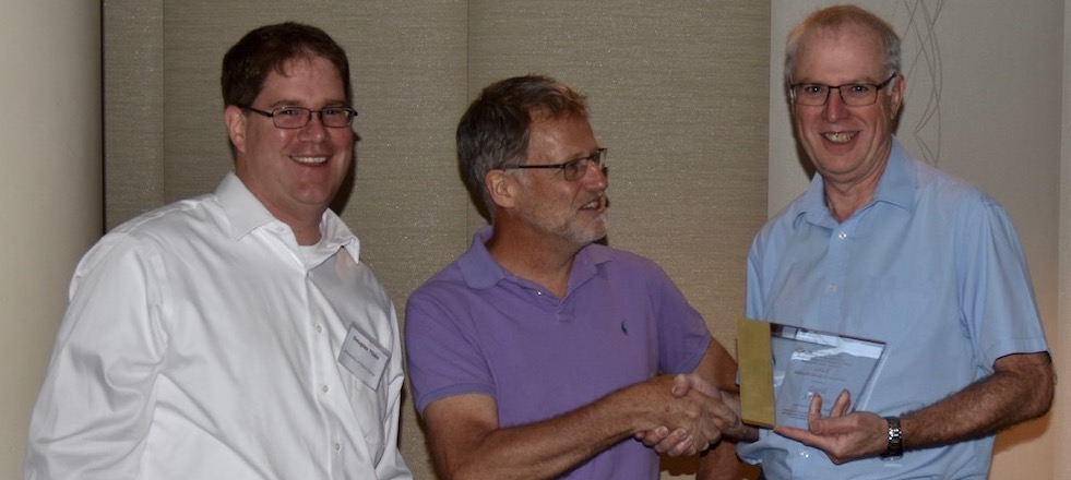 RCC Director Prof. David Abramson (right) received his HPDC Achievement Award from Prof. Douglas Thain (left), Chair, HPDC Award committee, and Prof. Ian Foster (centre), keynote session chair.