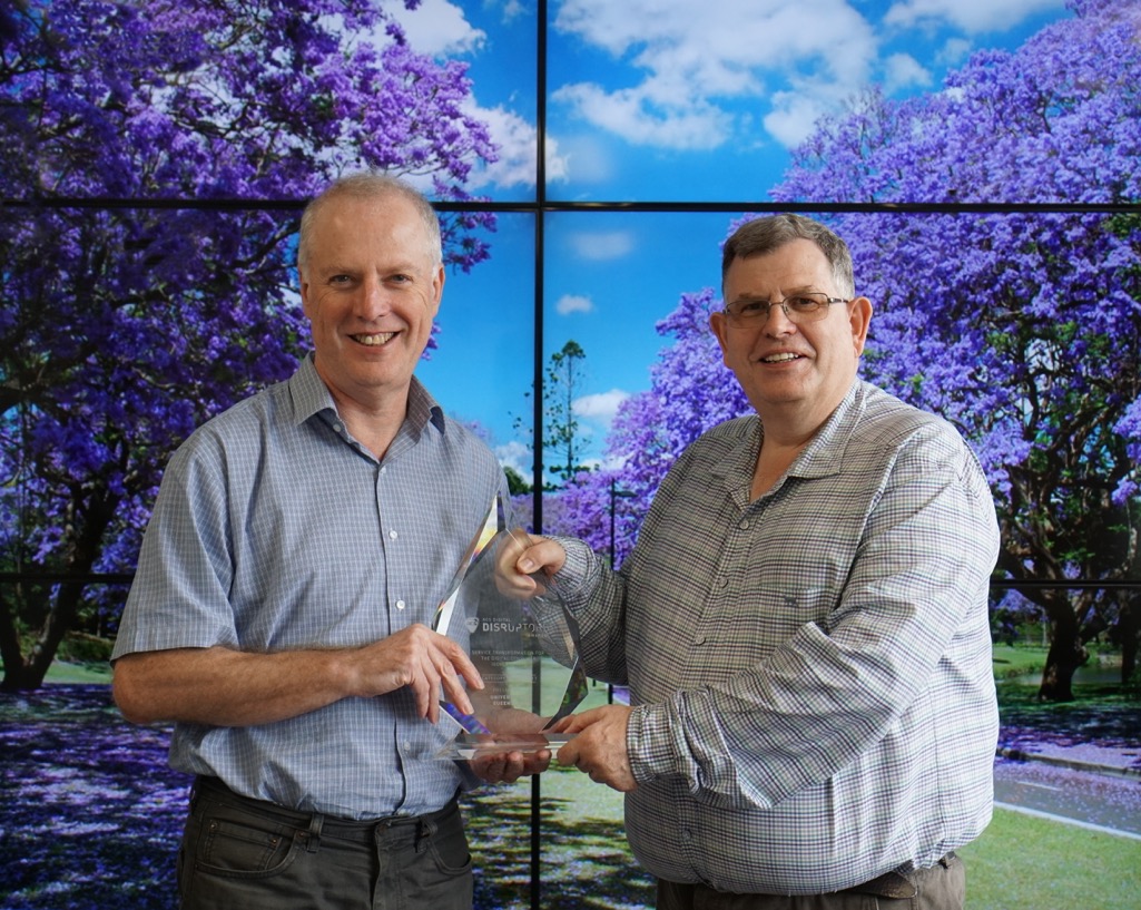 RCC Director Prof. David Abramson (left) received UQ's ACS Digital Disruptors Award from Nick Tate, chair of ACS' Queensland branch. (Photo: Dr Nick Hamilton, RCC/QCIF/IMB)  